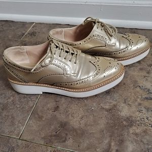 Gold oxford style loafers
